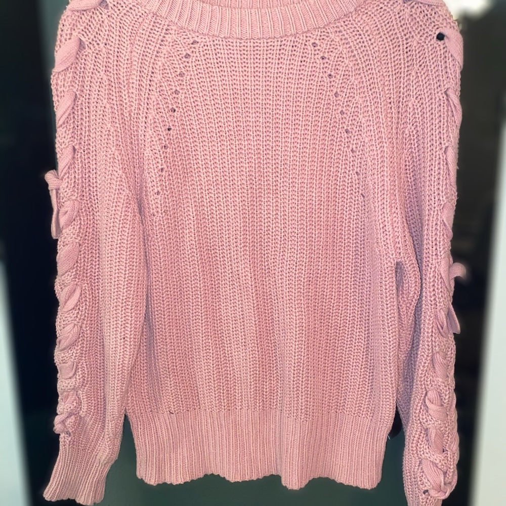 Light pink sweater. Medium thick.